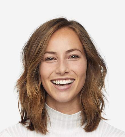 headshot of young woman with a smile