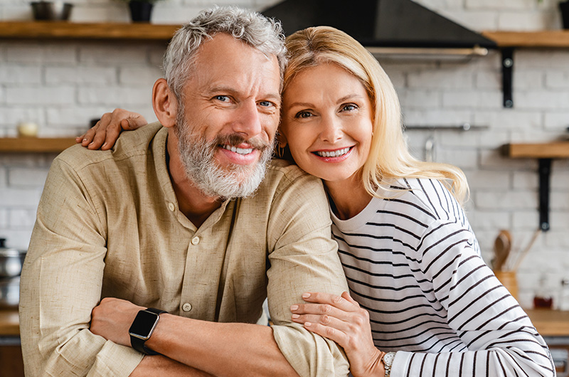 older couple with beautiful smiles