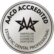 AACD Accredited seal for esthetic dental professionals, featuring the American Academy of Cosmetic Dentistry logo and text in black on a silver circular background.
